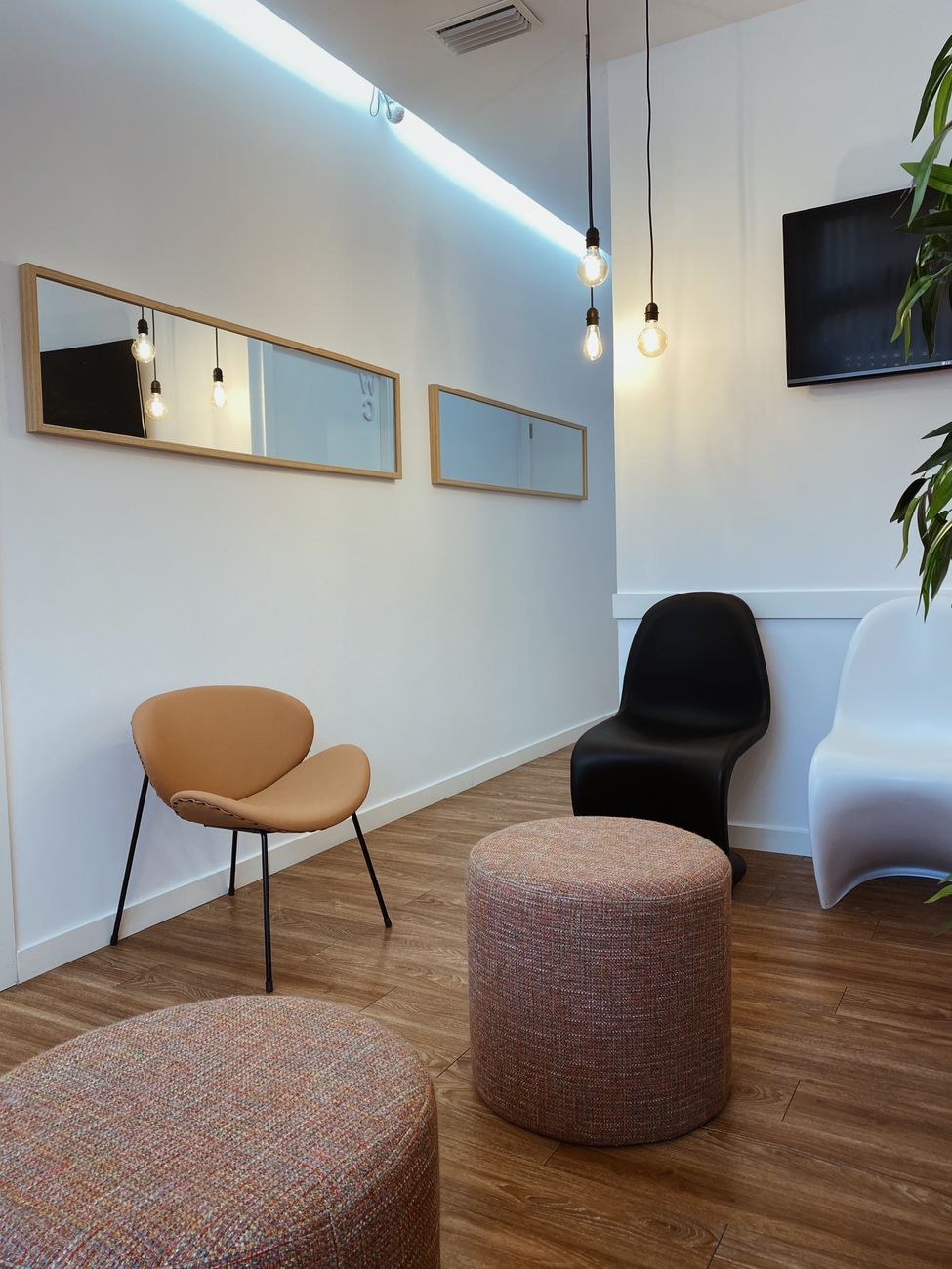 modern interior with chairs and mirrors